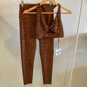 Beach riot twist top in brown spot.